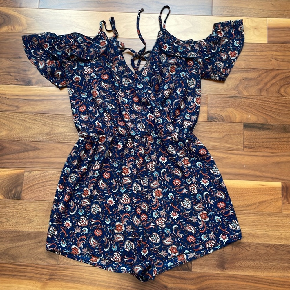 Romper with adjustable straps and snap at chest